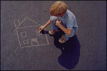 Boy drawing on walk