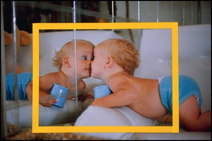 Baby reflected in mirror